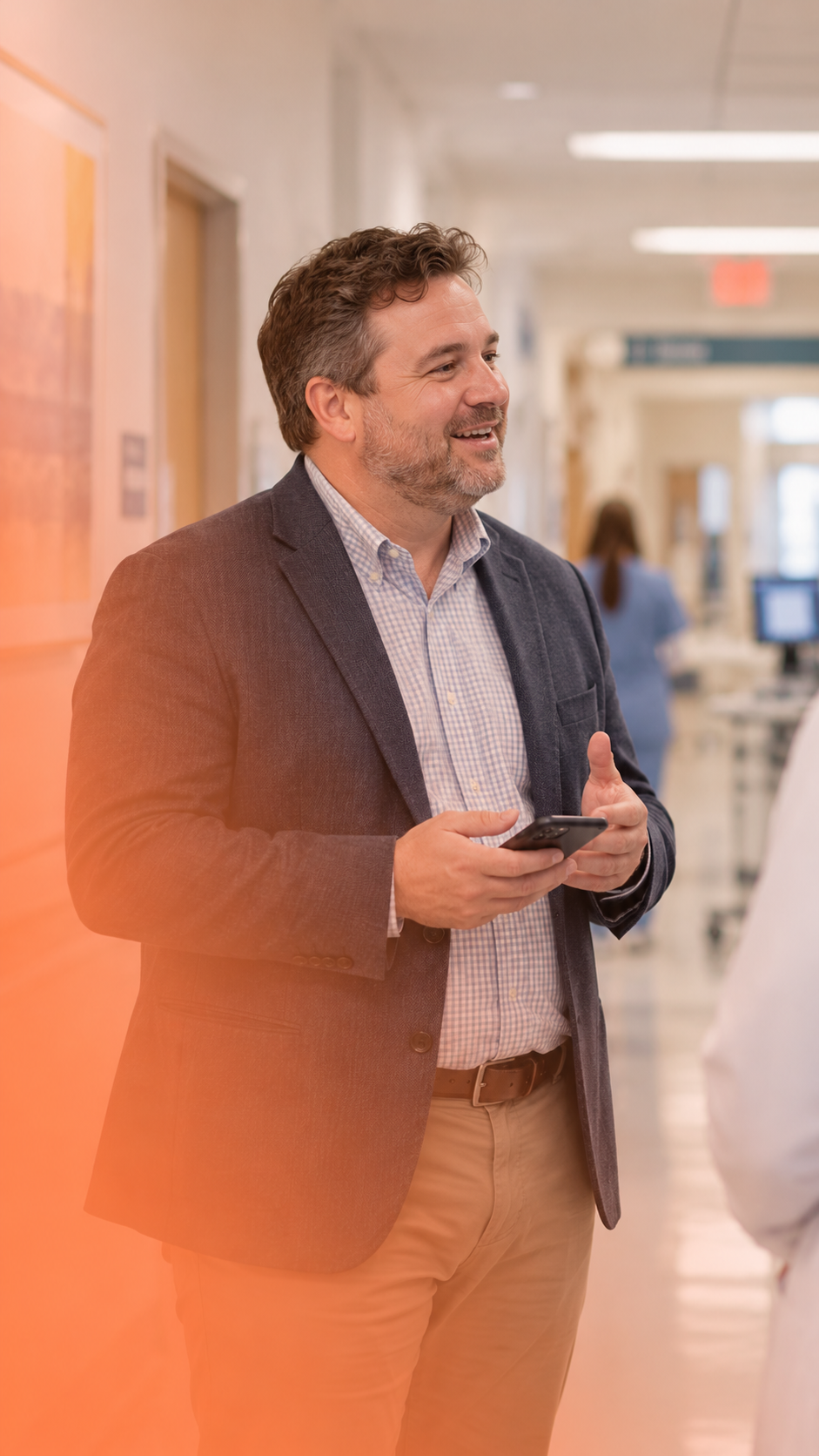 Marketer using a phone in a healthcare setting